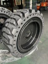 Шина цельнолитая в сборе с диском 31x10-16 Nexxus